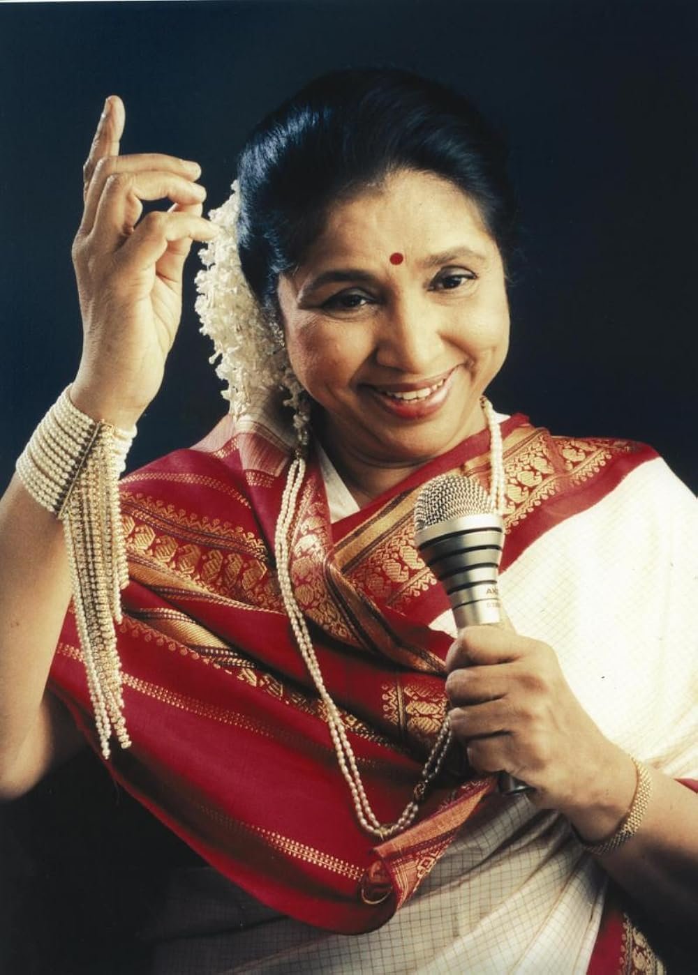 Asha bhosle singing journey struggle success tribute1